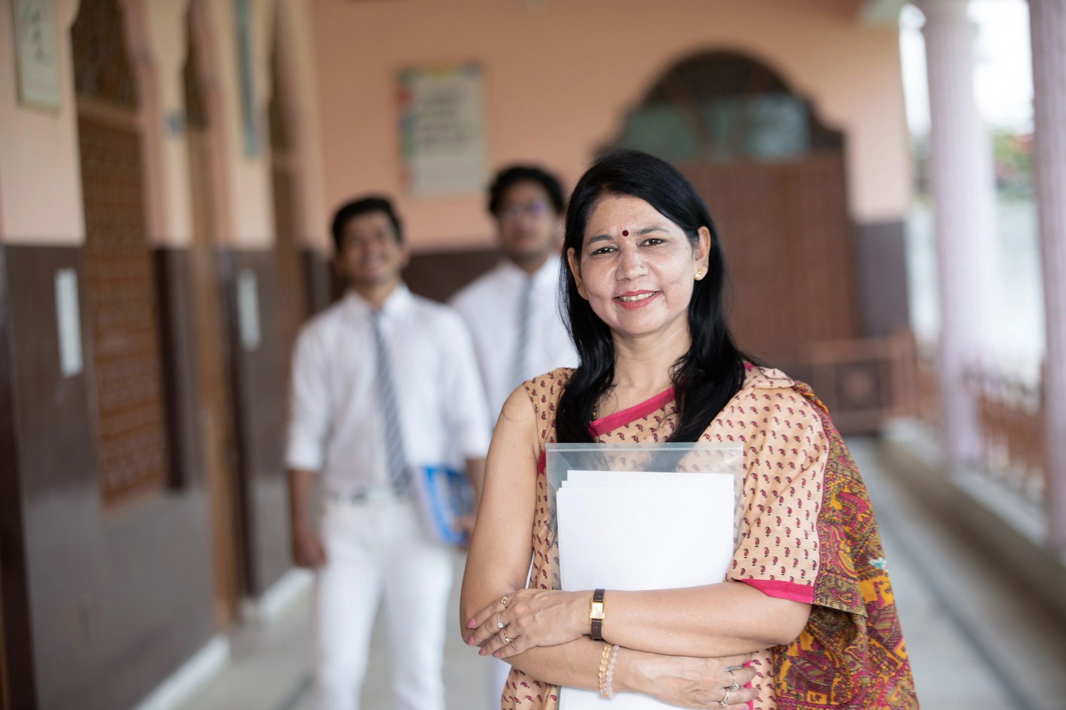 Training participant with students
